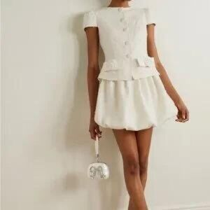 Elegant White Dress with Silver Purse